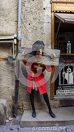 France, Carcassonneâ€” AUGUST 28, 2014. View of a mannequin of a medieval knight in stocks in the castle of Carcassonne Editorial Stock Photo
